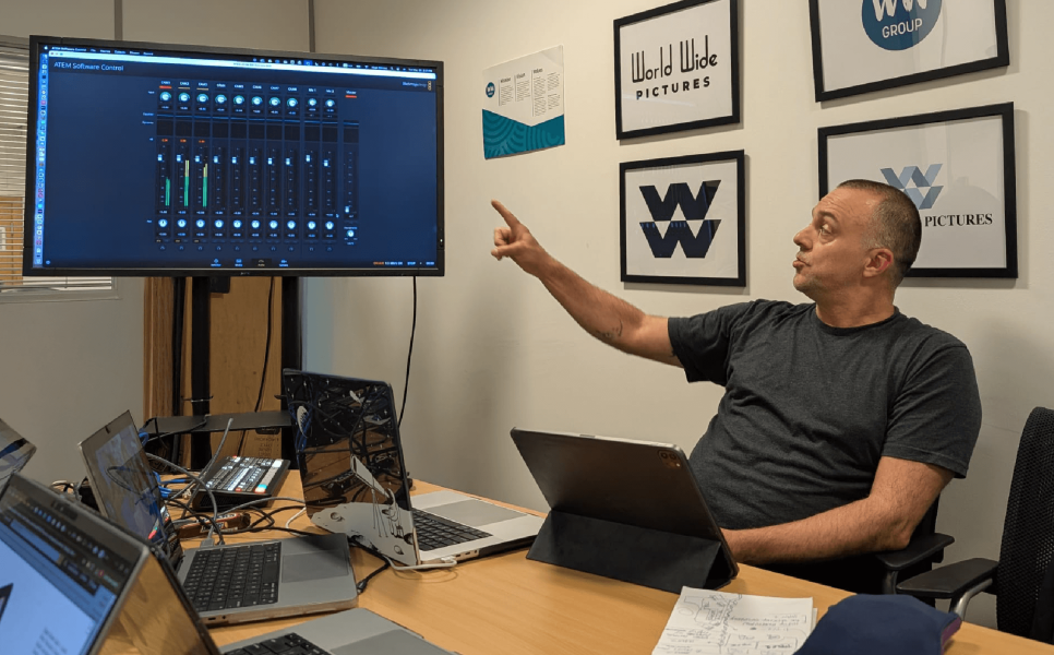 Hugo Simoes, Multimedia Director at World Wide Group delivering an internal seminar. Pointing at a screen showing visual mixing software.