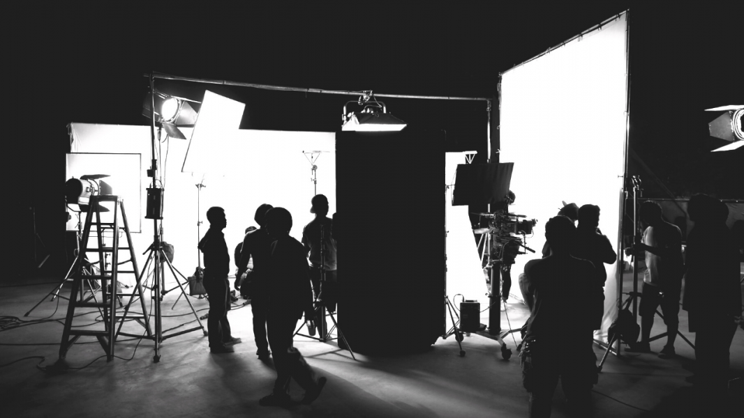 Black and white picture of a production crew setting up.